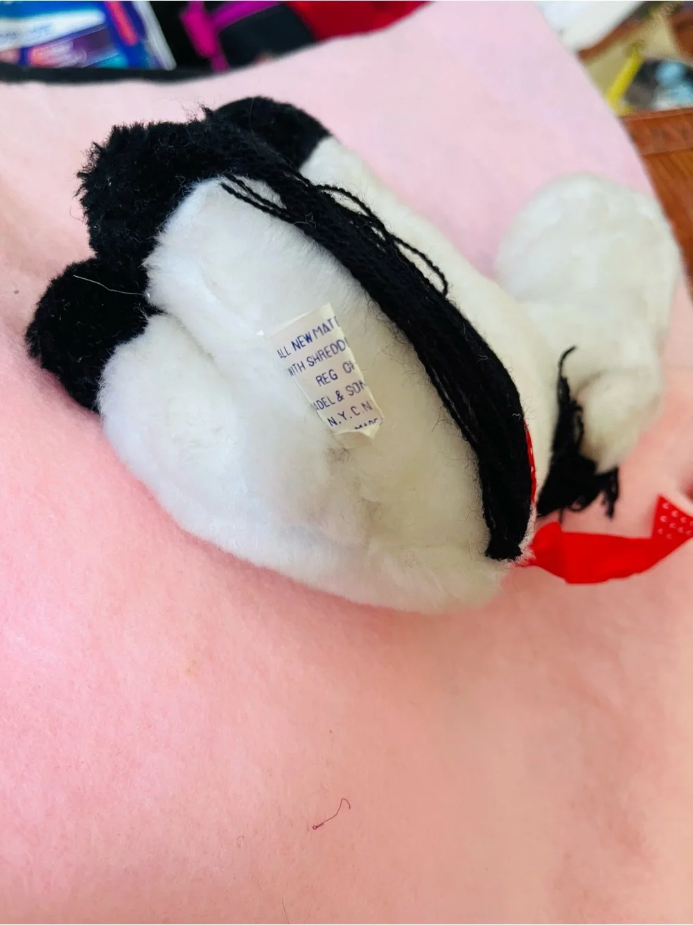 Plush White Horse with Red Ribbon